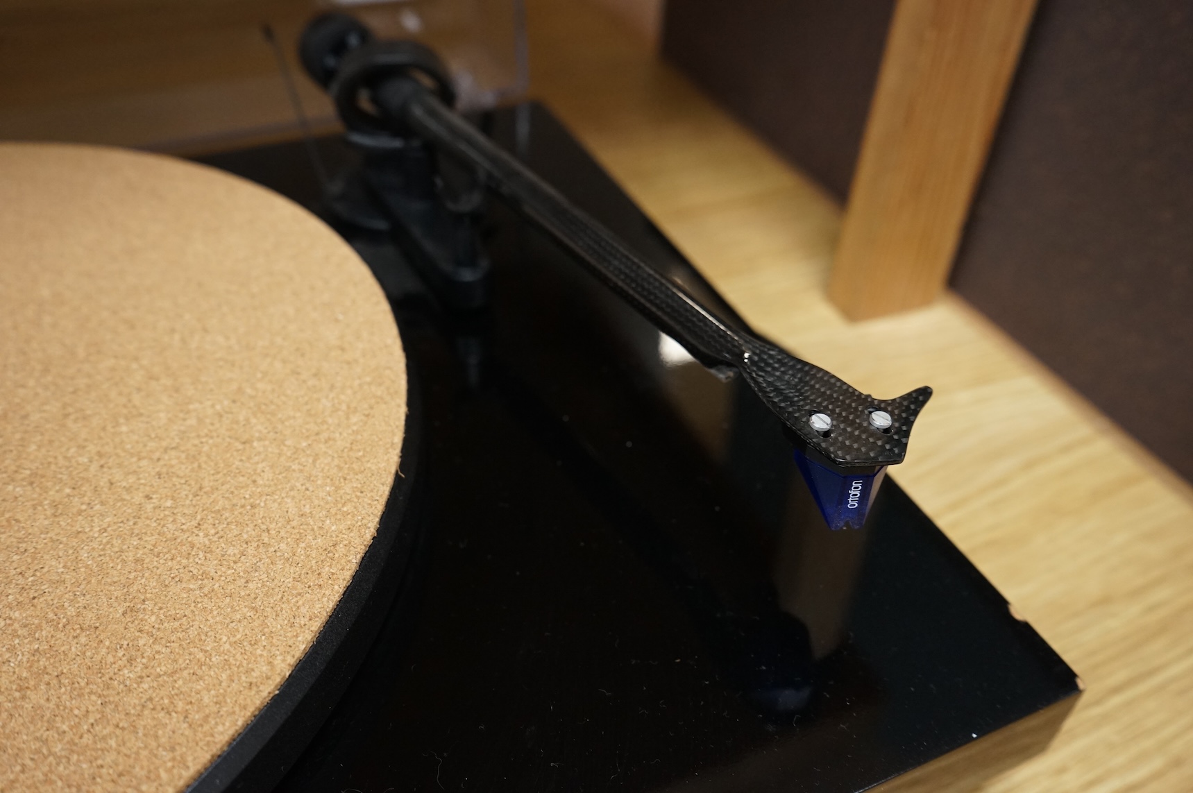 A Project Debut Carbon turntable with Ortofon 2m blue stylus and spare Ortofon 2m red stylus